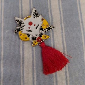White fox enamel pin with tassel